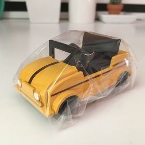 Miniature yellow toy car